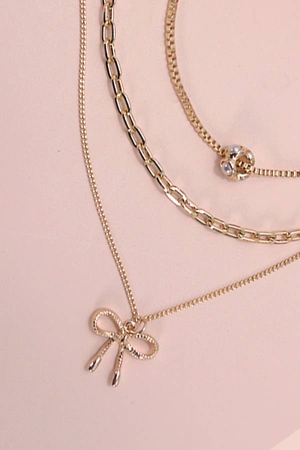 MULTI LAYER PEARL BOW CAHRM NECKLACE | 80N605 - Ember Boutique